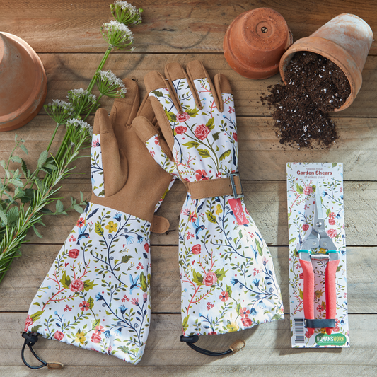 The Gardener’s Essentials Gift Set floral gloves with brown suede palms, garden shears, terracotta pots by Womanswork on Tampa Home & Garden Store