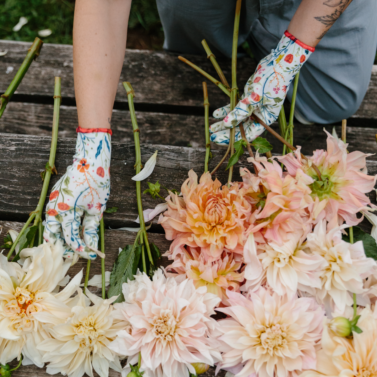 Nitrile Weeder Gloves with floral print on white background, blossoms, red cuff by Womanswork on Tampa Home & Garden Store