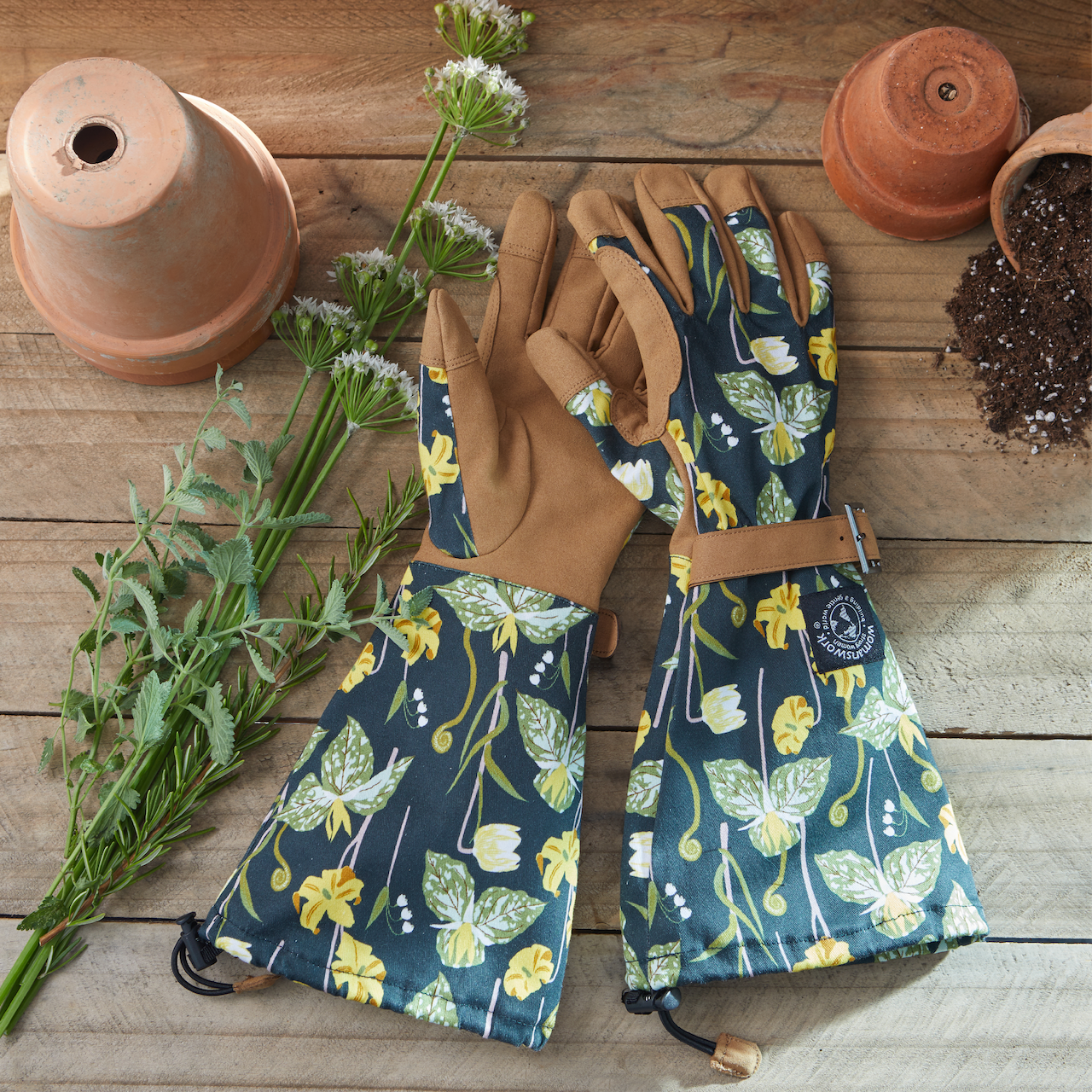 Arm Saver Gloves pair by Womanswork - floral navy fabric and tan leather palms with strap on Tampa Home & Garden Store