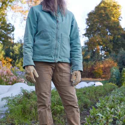 The Original Leather Work Gloves by Womanswork, tan leather gardening gloves worn outdoors on Tampa Home & Garden Store