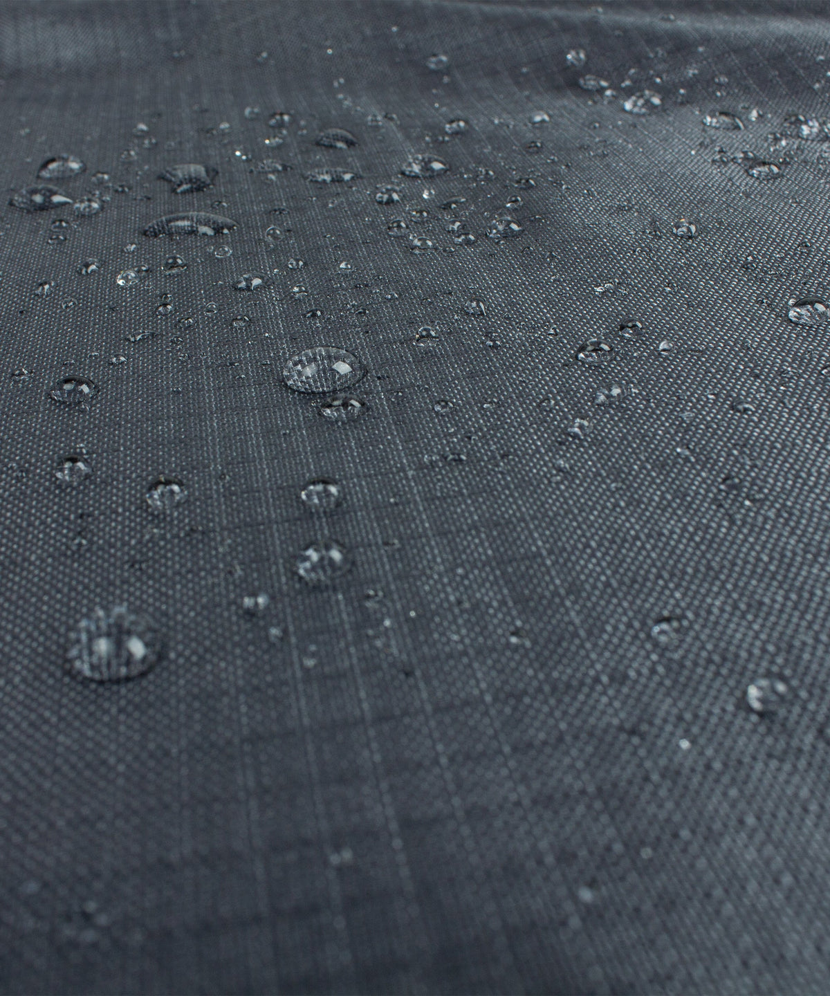 Grill cart cover Shield Outdoor Covers on textured dark fabric with water droplets on Tampa Home & Garden Store