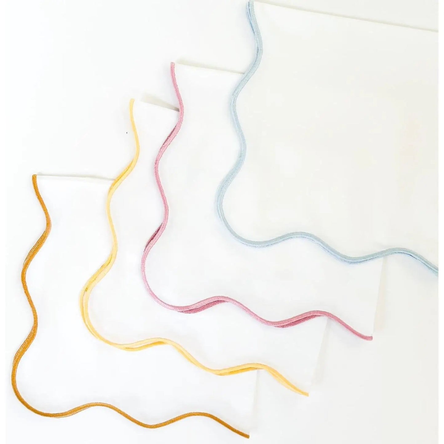 Wave Napkin with Coastal Wave Trim White napkins with wave trim (orange,yellow,pink,blue) on Tampa Home & Garden Store