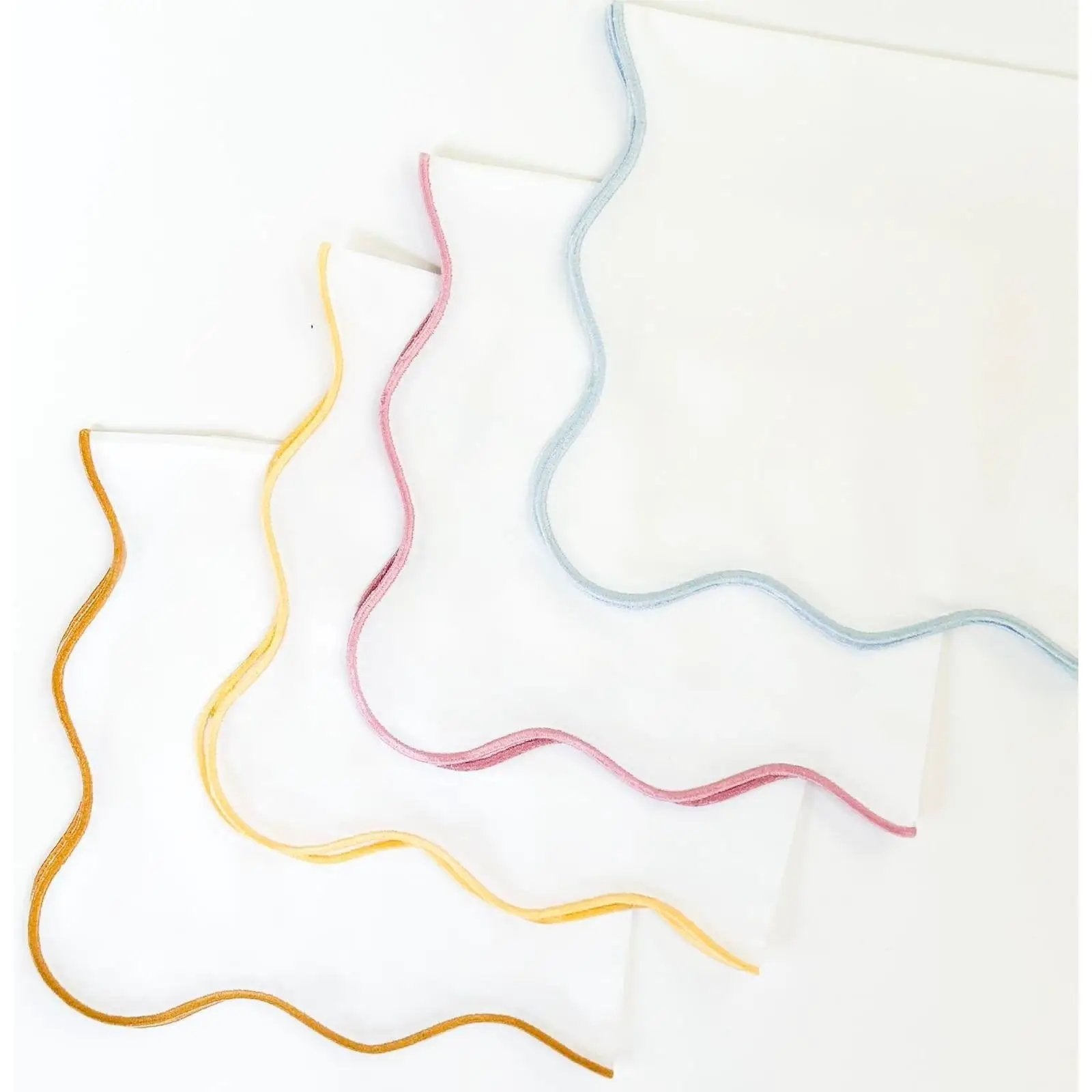 Wave Napkin with Coastal Wave Trim White napkins with wave trim (orange,yellow,pink,blue) on Tampa Home & Garden Store