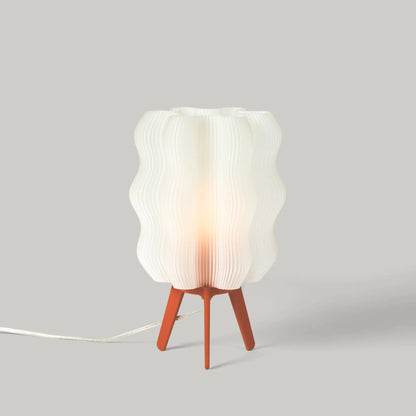Eco Friendly Wavy Jellyfish Desk Light by Wooj Design with white pleated shade on orange tripod on Tampa Home & Garden Store