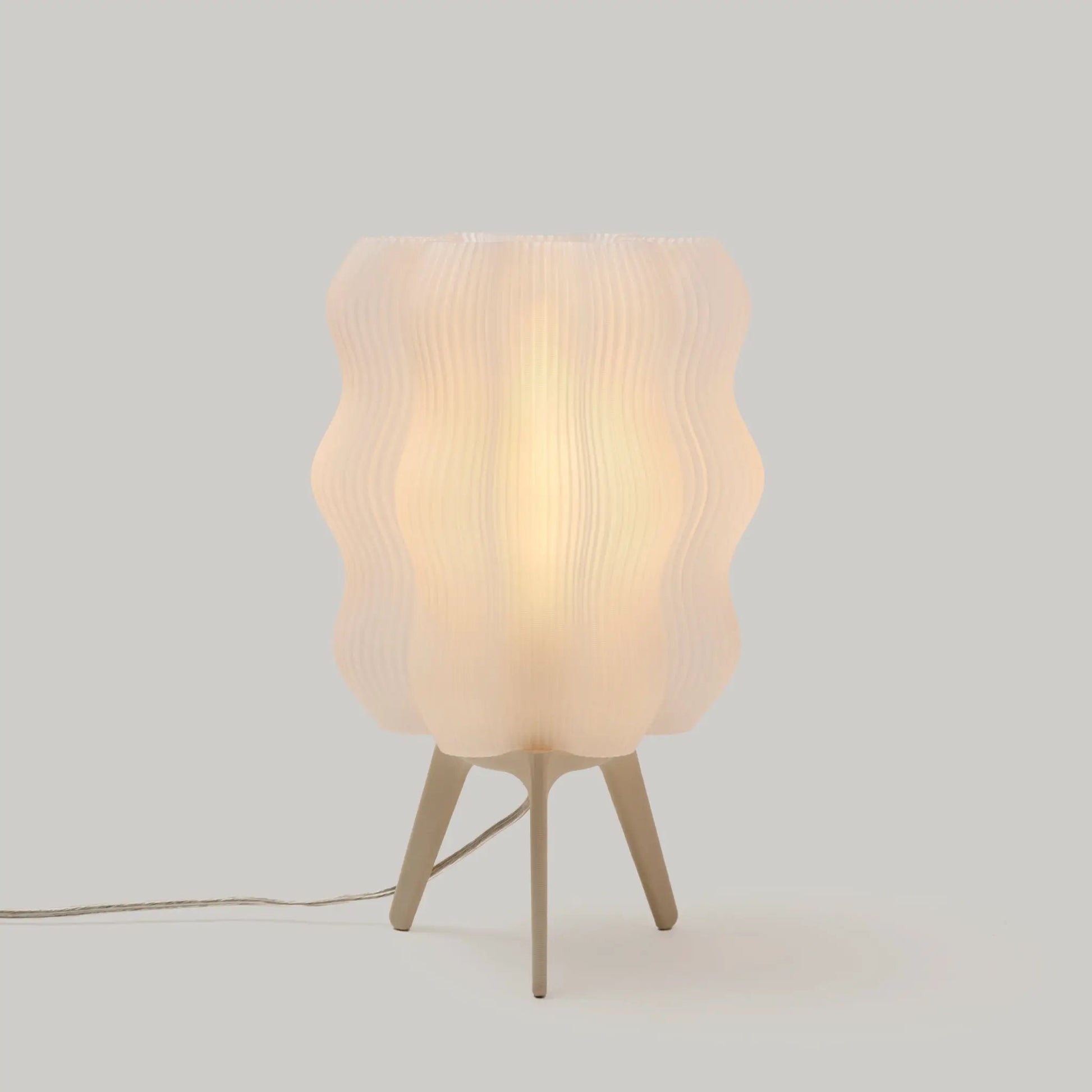 Eco Friendly Wavy Jellyfish Desk Light by Wooj Design; beige ribbed shade, wooden tripod base on Tampa Home & Garden Store