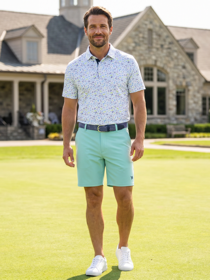 Links Print Polo by White Water Life, white polo shirt with blue print pattern on Tampa Home & Garden Store