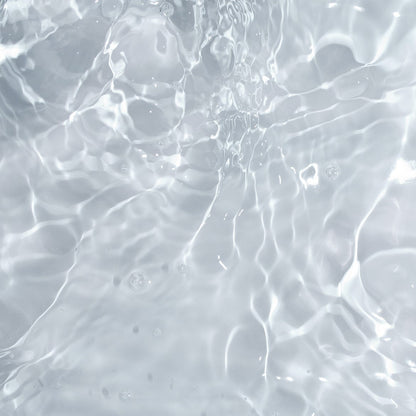 Flaura Eau De Parfum water texture background with shimmering ripples UpCircle perfume branding on Tampa Home & Garden Store