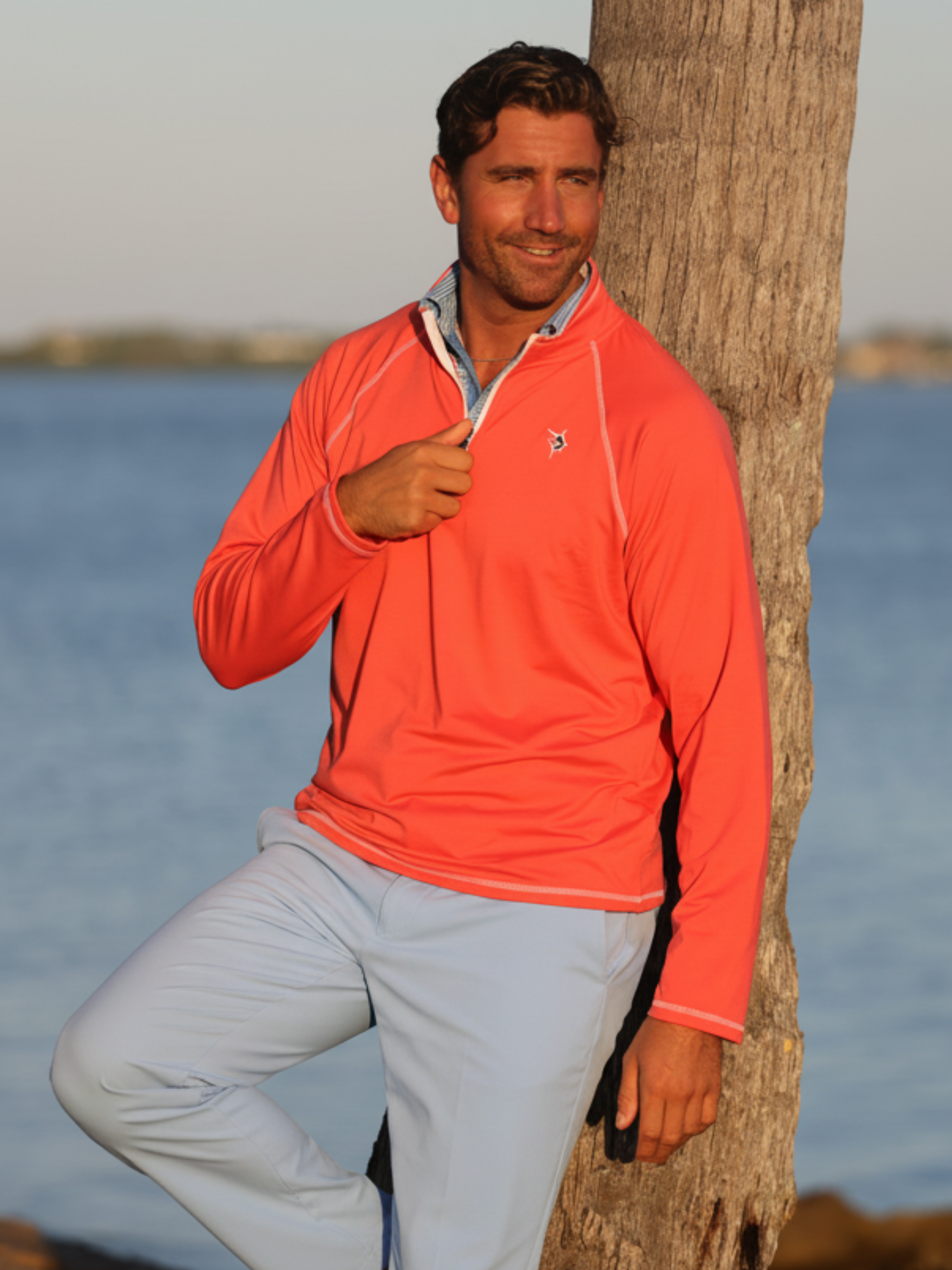 New Harbor Quarter Zip Effortless Comfort coral athletic top by White Water Life with white piping on Tampa Home & Garden Store