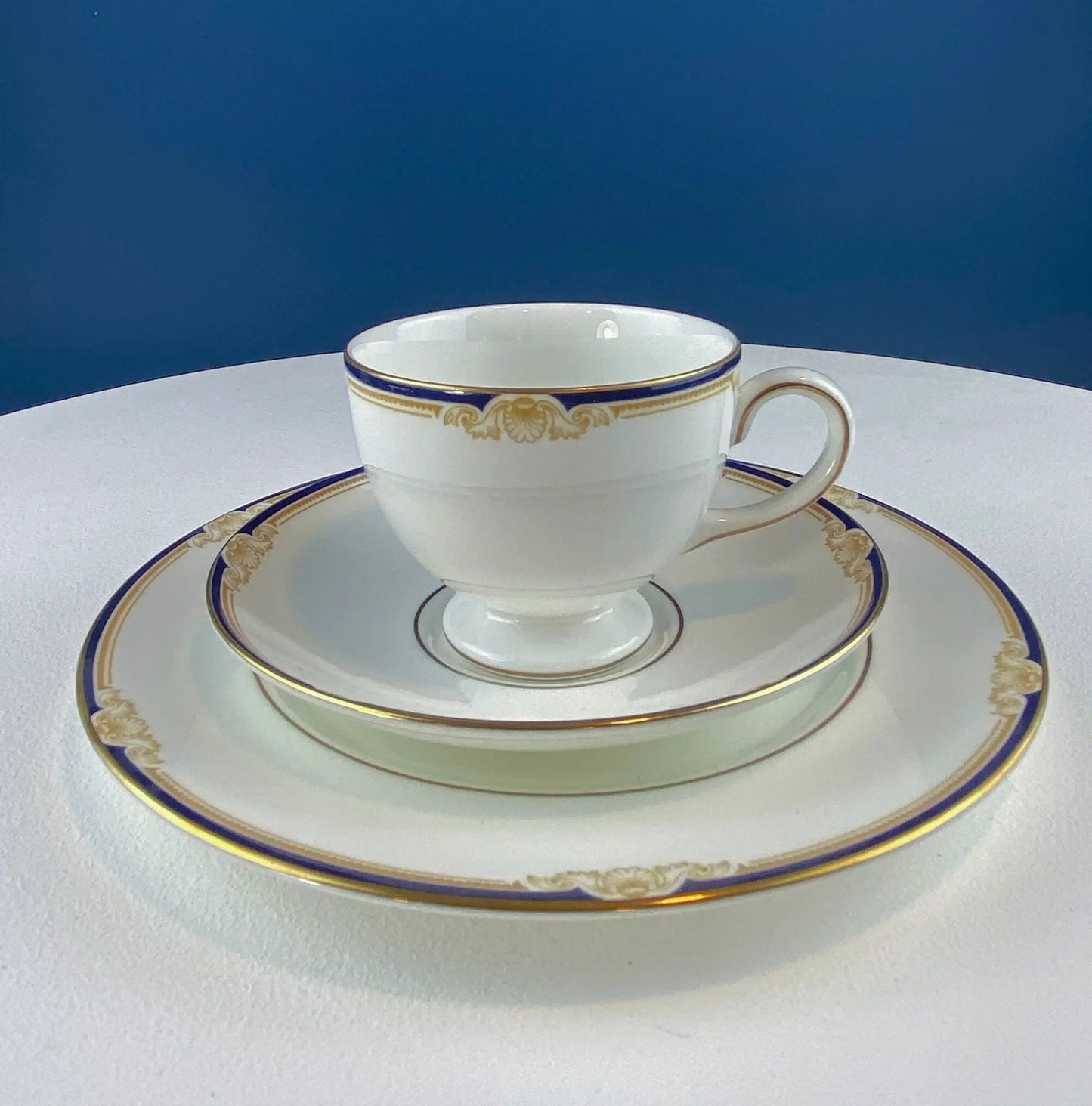 Wedgewood Cavendish teacup, saucer and plate set with blue and gold trim on white porcelain on Tampa Home & Garden Store