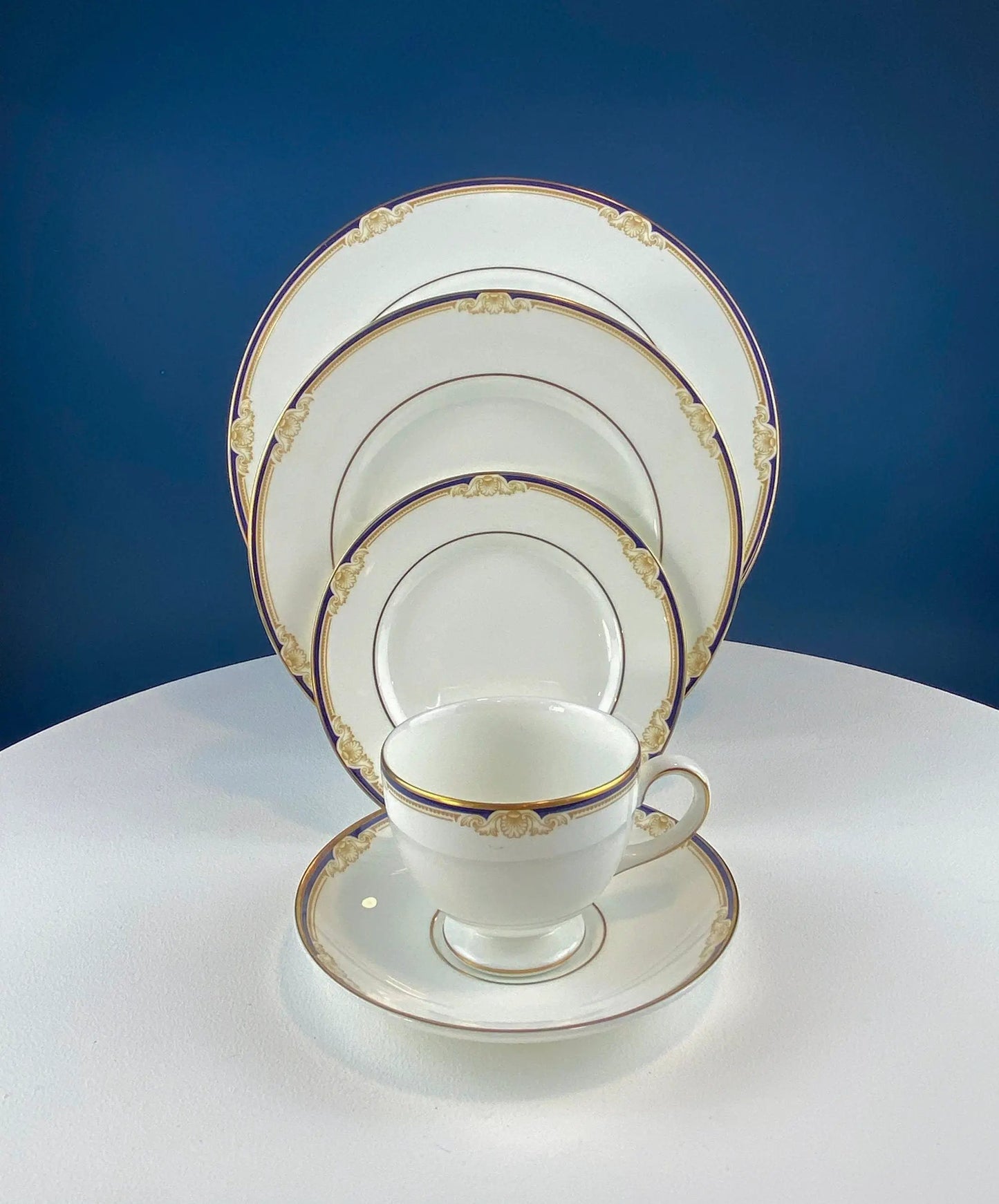 Wedgewood Cavendish 20-piece dinnerware set with cups and saucers in white with gold trim on Tampa Home & Garden Store
