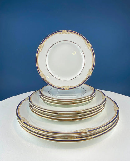 Wedgewood Cavendish dinnerware plates with gold and purple trim stacked for service on Tampa Home & Garden Store
