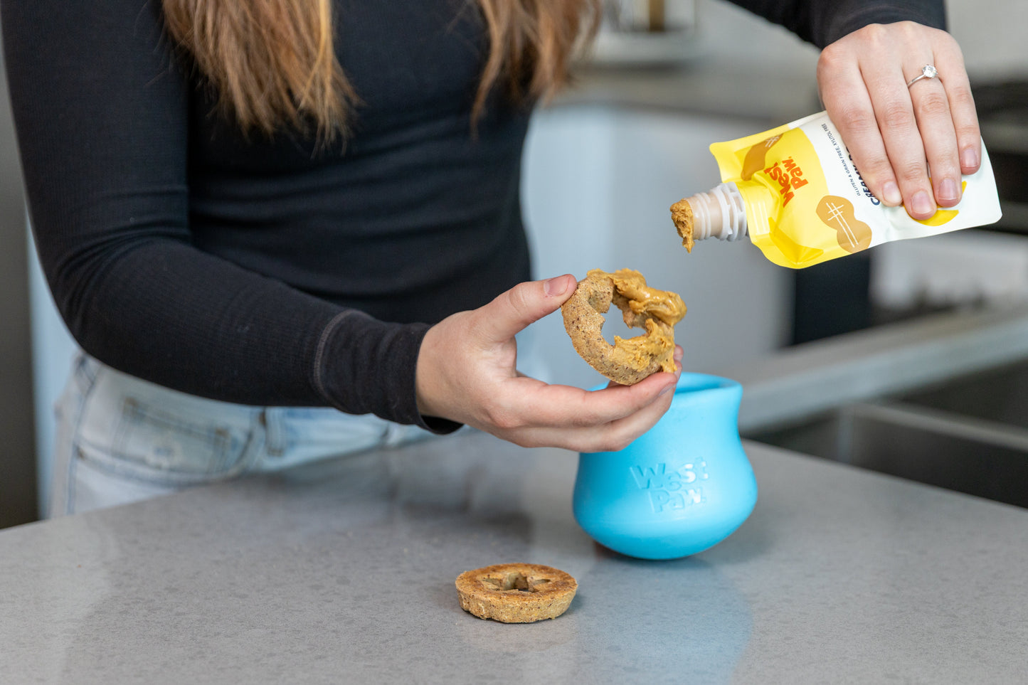 Toppl Treat dog treat dispensing toy by West Paw with peanut butter rings, 2 rings on Tampa Home & Garden Store