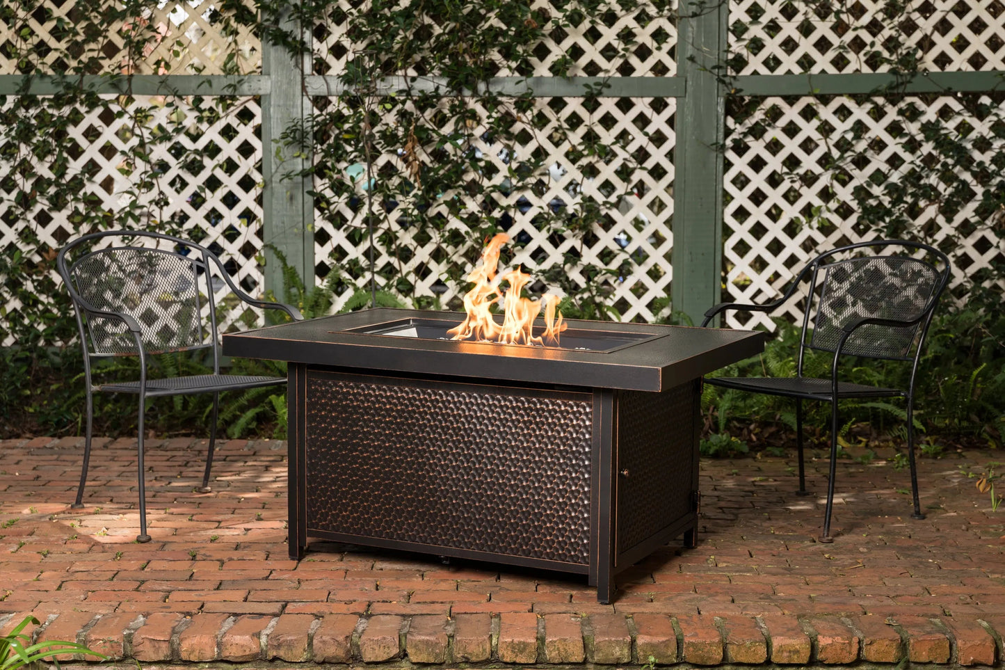 Weyland rectangle aluminum LPG gas fire pit on brick patio with chairs on Tampa Home & Garden Store