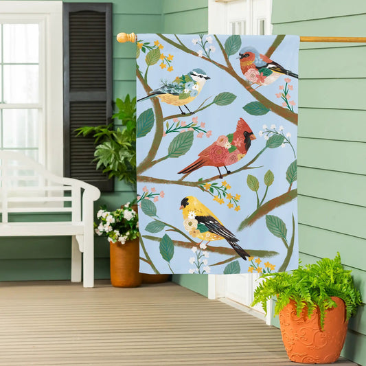 What She Shed Birds Suede House Flag with vibrant bird artwork on light blue background on Tampa Home & Garden Store