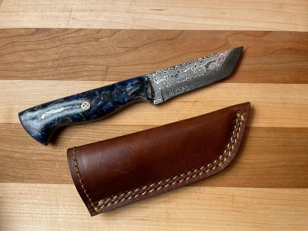 Titan Damascus Utility Tanto knife with damascus blade and blue resin handle on Tampa Home & Garden Store