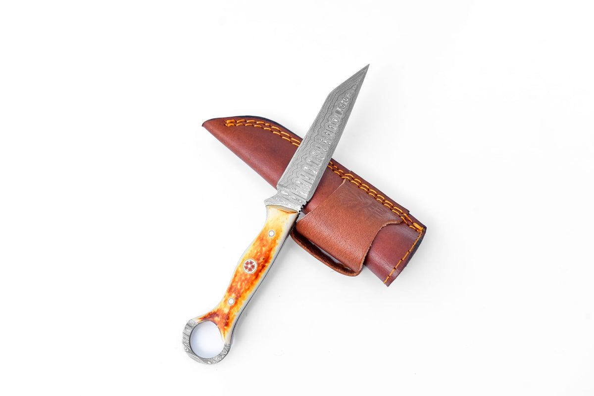 Sundancer Burnt Bone Utility TK-217 knife with blade and bone handle in leather sheath on Tampa Home & Garden Store