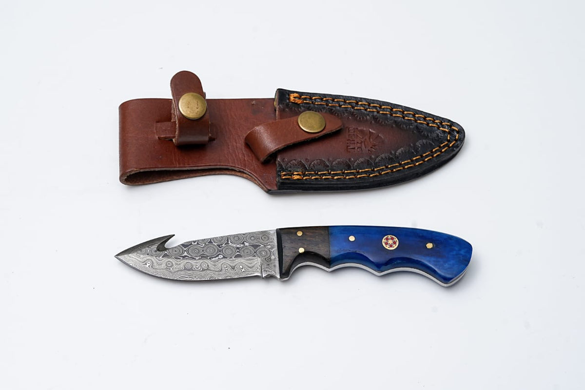 Damascus gut hook knife Titan TD-176 with blue handle and brass rivets leather sheath on Tampa Home & Garden Store