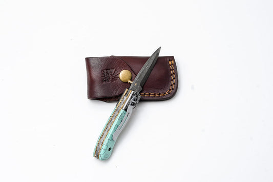 Turquoise Damascus Knife TF-090 with engraved bolster and turquoise handle in leather sheath on Tampa Home & Garden Store
