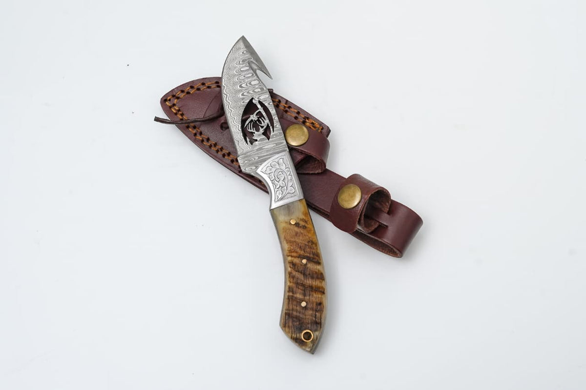 Wire-Cut Damascus Guthook Knife with Ram Horn Handle, TK-418 by Titan International K, leather sheath on Tampa Home & Garden Store