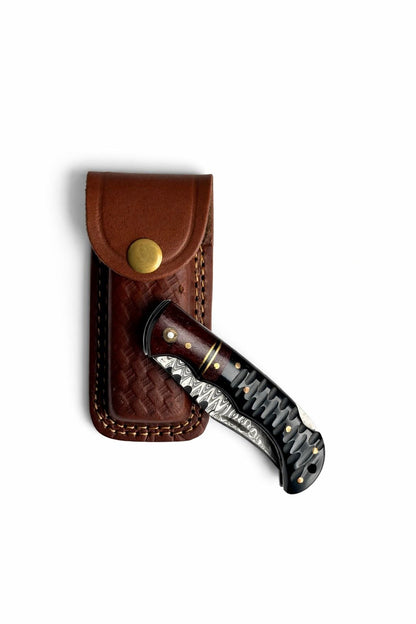 Titan Ironclaw folding knife TF-081, black textured handle, brass pins, leather sheath on Tampa Home & Garden Store