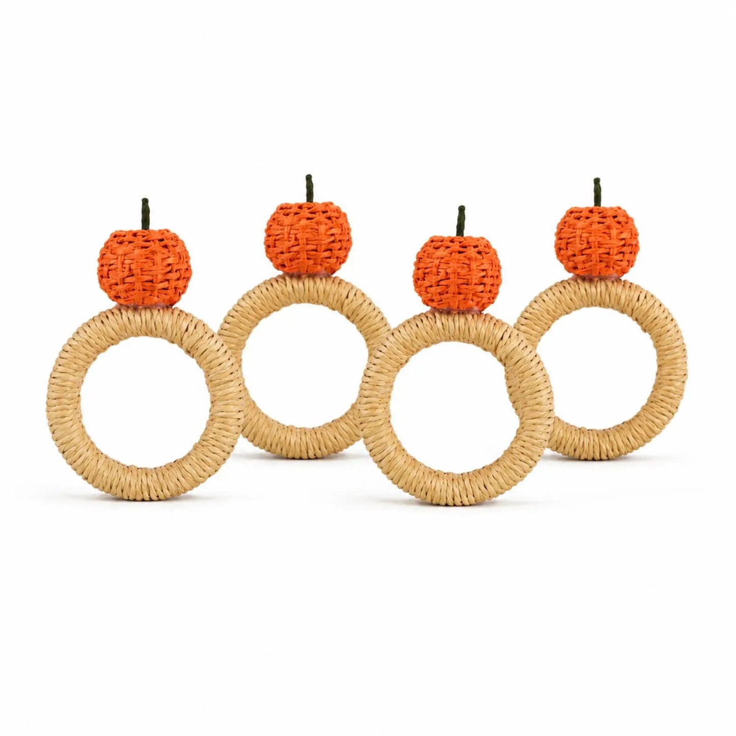 Handwoven orange napkin rings with orange woven balls and green stems on wicker rings on Tampa Home & Garden Store