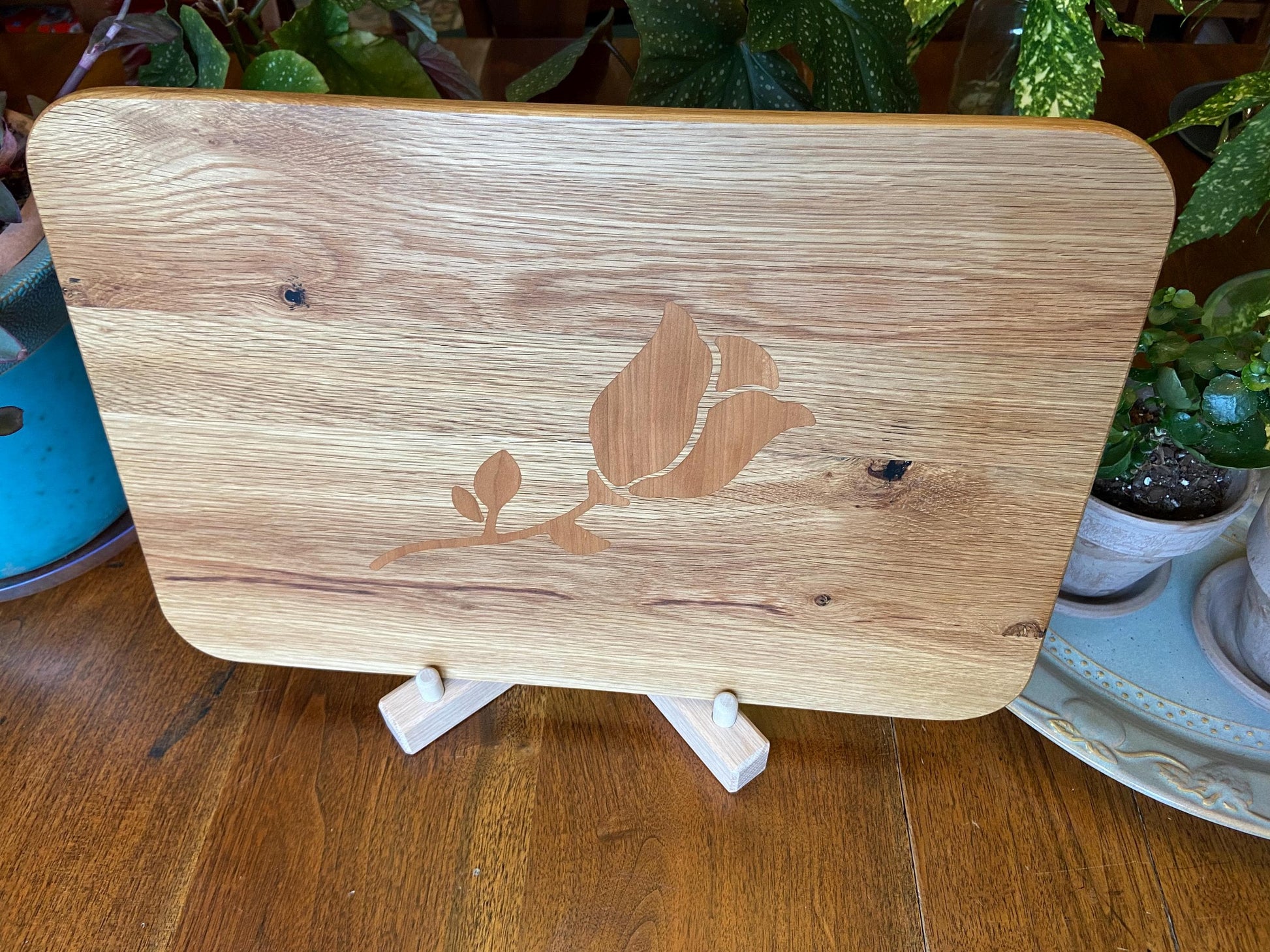 White Oak charcuterie board with subtle rose and stem inlay made from Cherry. - Tampa Home & Garden Store