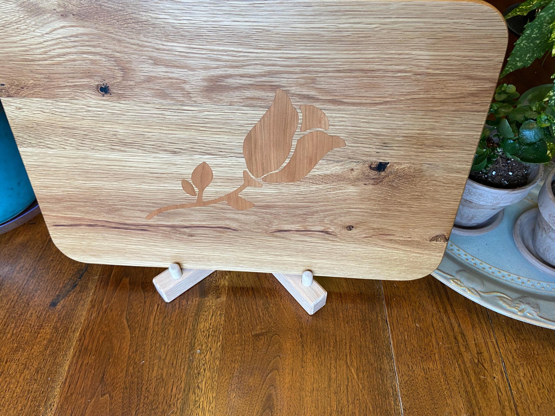 White Oak charcuterie board with subtle rose and stem inlay made from Cherry. - Tampa Home & Garden Store