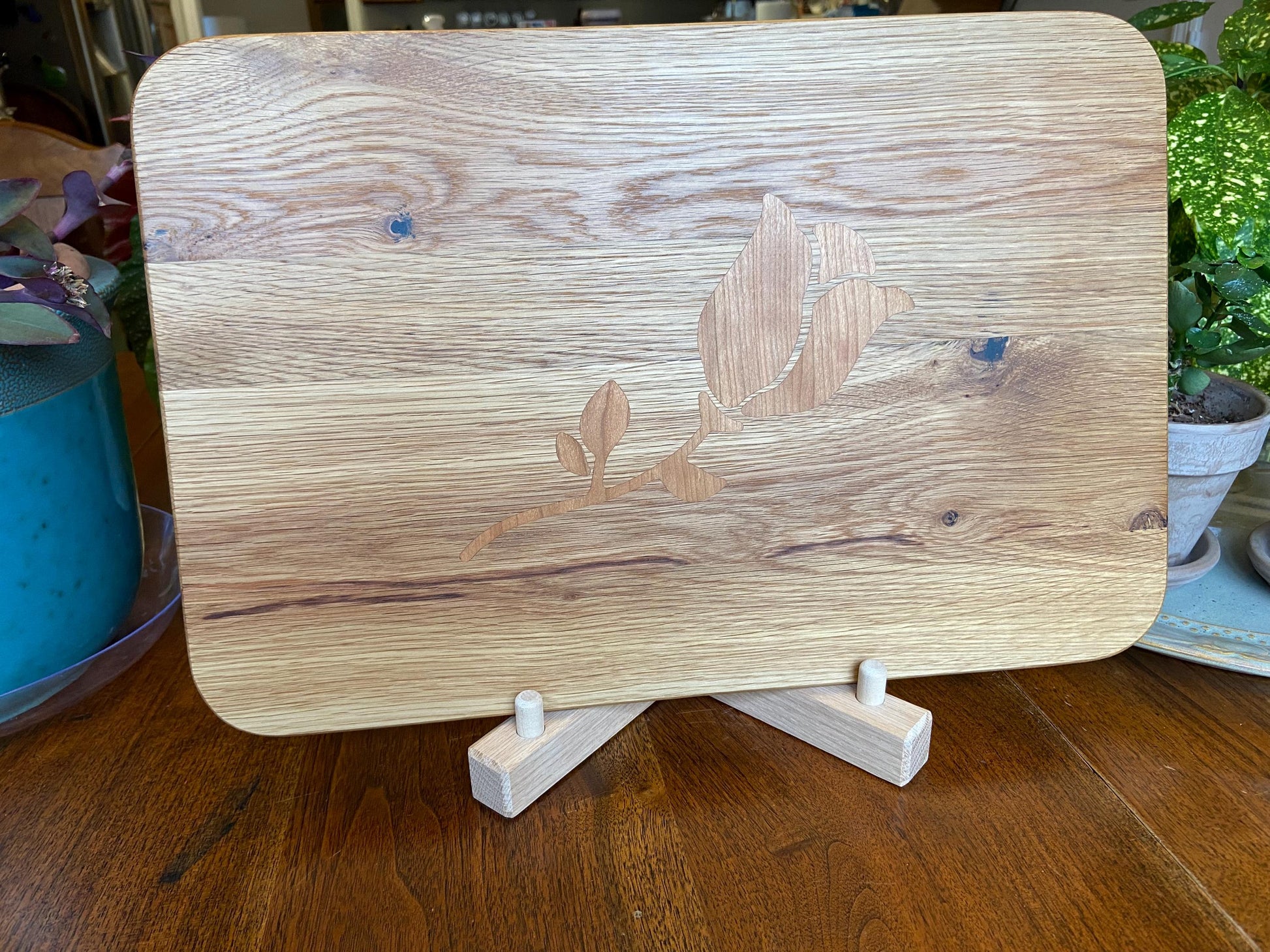 White Oak charcuterie board with subtle rose and stem inlay made from Cherry. - Tampa Home & Garden Store
