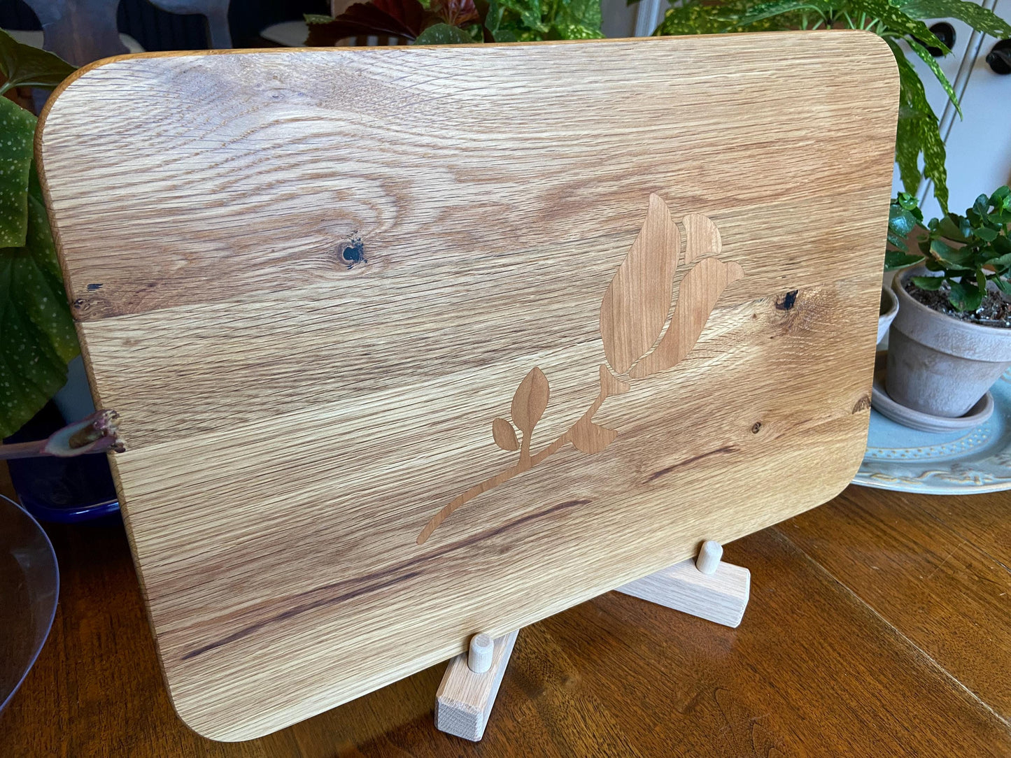 White Oak charcuterie board with subtle rose and stem inlay made from Cherry. - Tampa Home & Garden Store