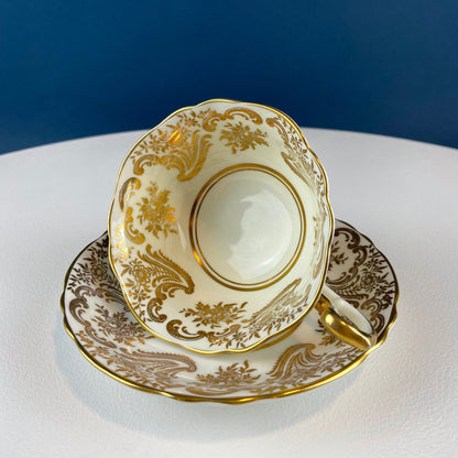 White and Gold Cup and Saucer. Paragon Porcelain, By Appointment to Her Majesty the Queen Potters. Dining Room Cabinet Display. - Tampa Home & Garden Store