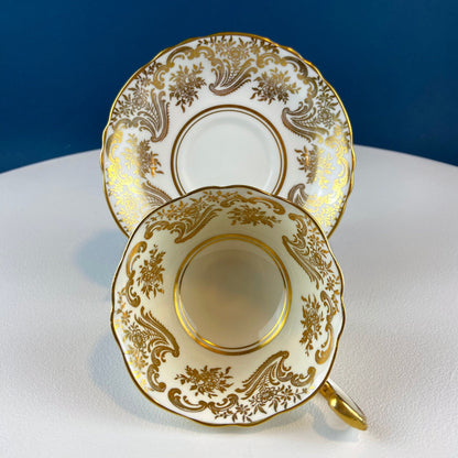 White and Gold Cup and Saucer. Paragon Porcelain, By Appointment to Her Majesty the Queen Potters. Dining Room Cabinet Display. - Tampa Home & Garden Store