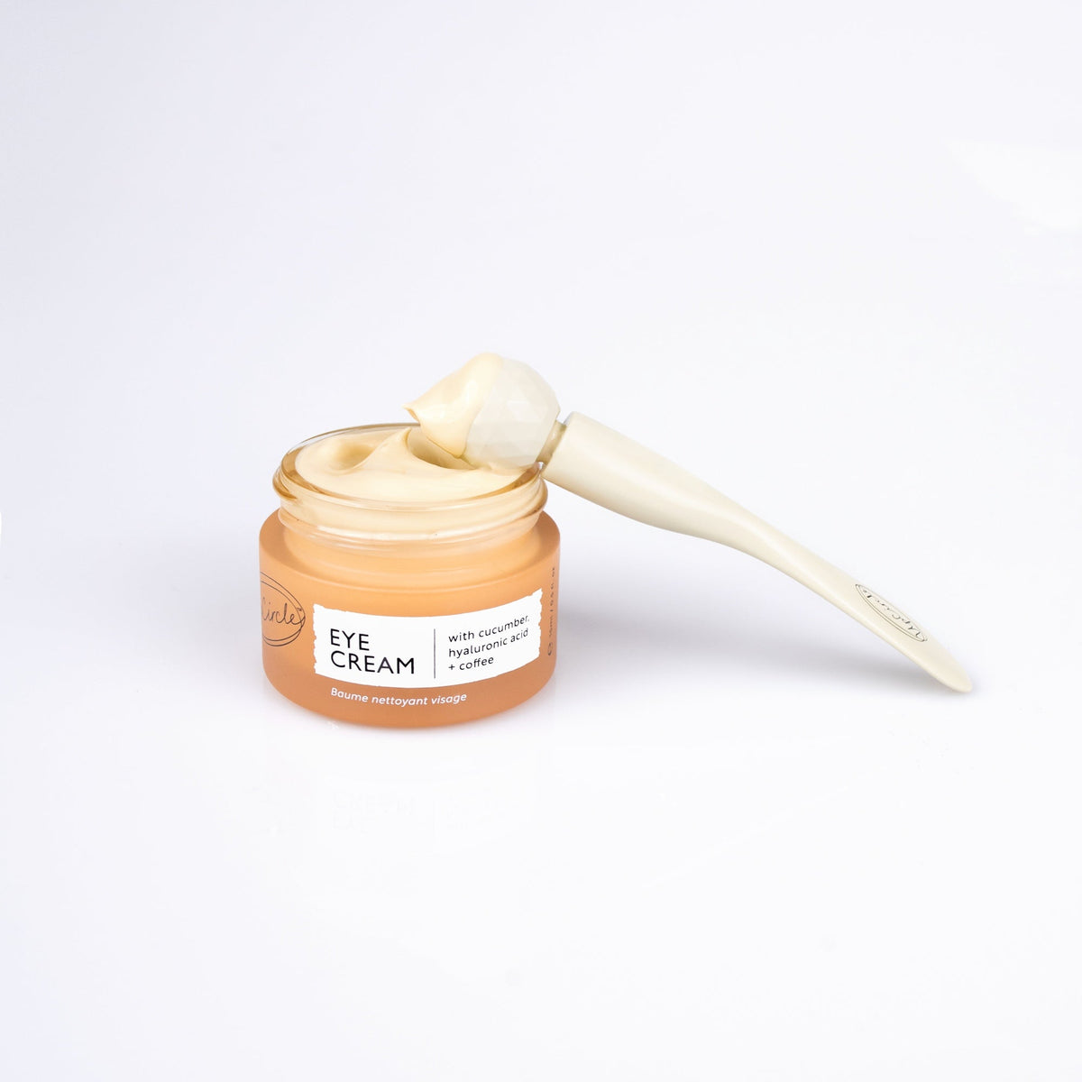 UpCircle Eye Cream jar in peach with cream on spatula, label visible on Tampa Home & Garden Store
