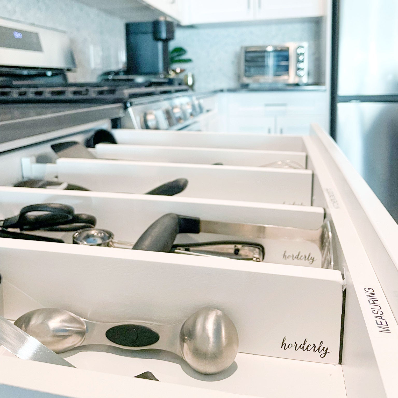 Bamboo Expandable Drawer Dividers White by Horderly in a kitchen drawer with multiple dividers on Tampa Home & Garden Store