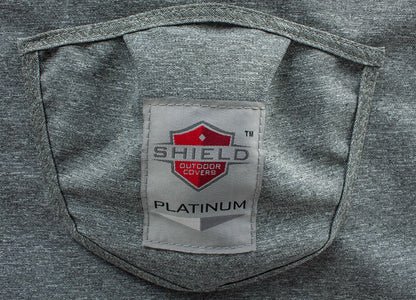 Round fire table cover, Platinum Series, gray denim fabric with Shield Outdoor Covers logo patch on Tampa Home & Garden Store