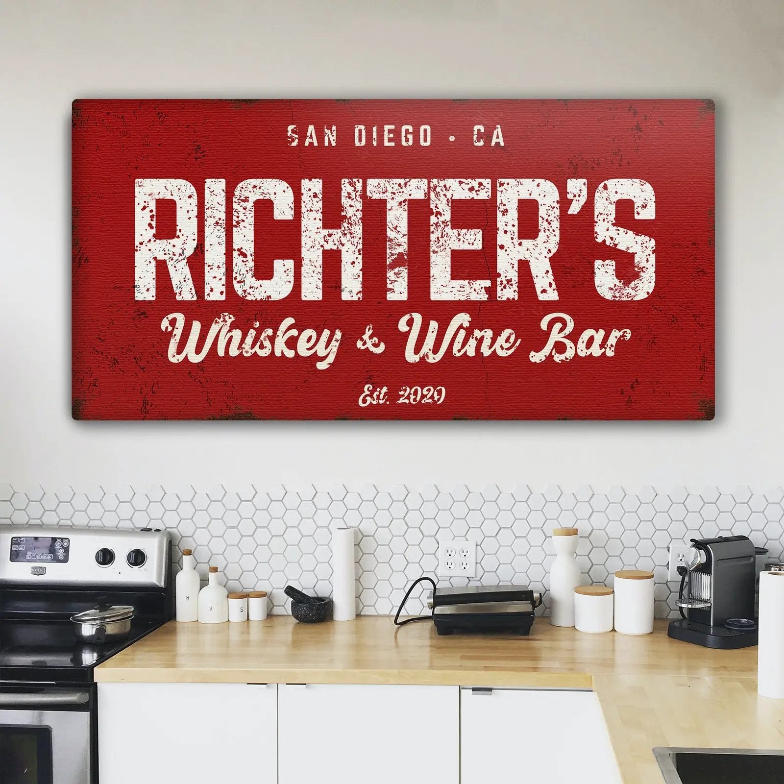 Whiskey And Wine Bar Sign by Tailored Canvases on red distressed canvas with white lettering on Tampa Home & Garden Store