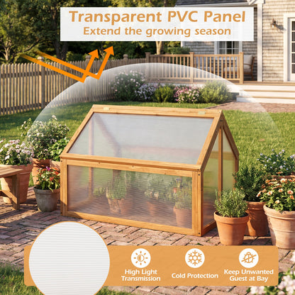Wood cold frame greenhouse with transparent roof panels in a garden raised planter setup on Tampa Home & Garden Store
