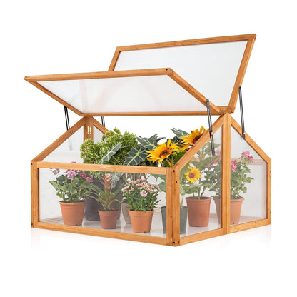 Wood cold-frame greenhouse with openable transparent roof in orange; raised flower planter on Tampa Home & Garden Store