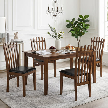 Dining chairs set of 4 with spindle back and black PU leather seats in warm brown wood on Tampa Home & Garden Store
