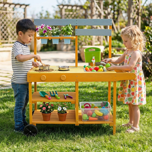 Wooden play kitchen on wheels, yellow with blue panels, kids cooking with toy vegetables on Tampa Home & Garden Store