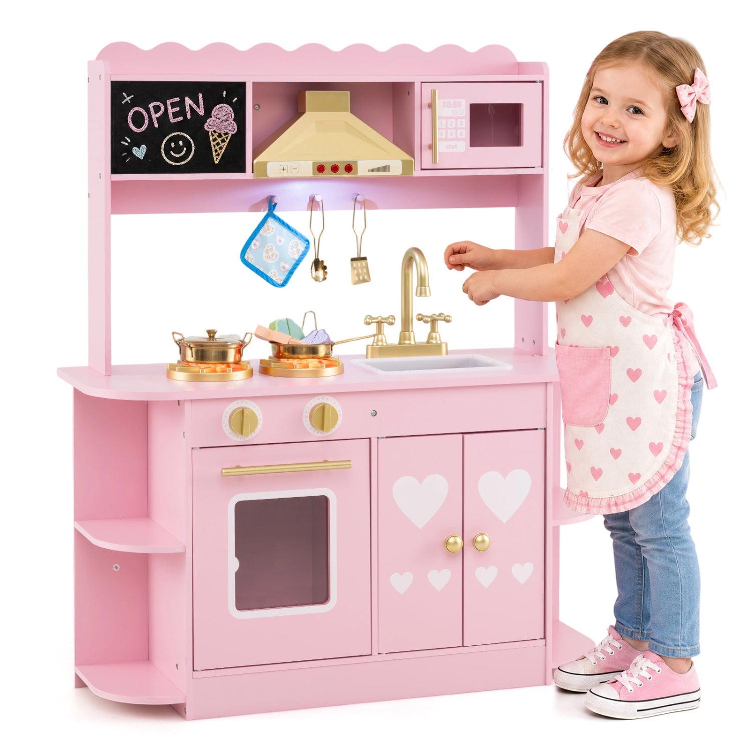 Pink wooden play kitchen set with lights and sounds, gold faucet and stove, child playing chef on Tampa Home & Garden Store