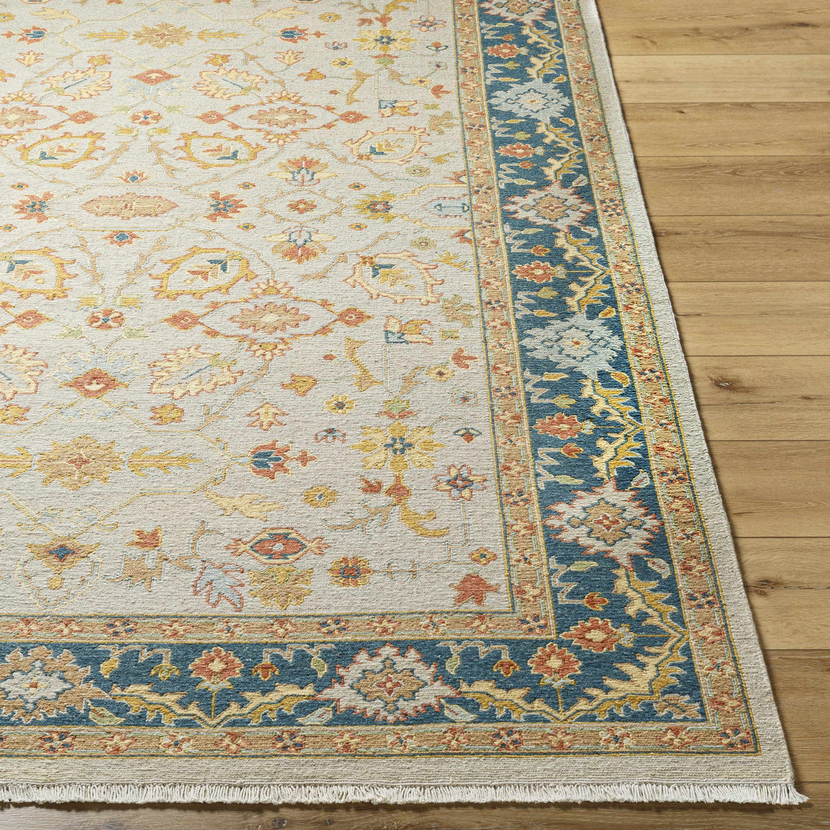 Yenimahalle Premium Rug ivory field with blue border and floral motifs Boutique Rugs on Tampa Home & Garden Store