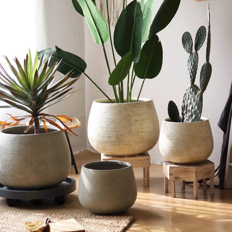 Rustic Globe Cement Planters by RusticReach; beige textured cement pots on Tampa Home & Garden Store
