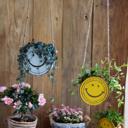 Happy Face Hanging Planter by RusticReach, yellow smiley lid with greens; two hanging planters on Tampa Home & Garden Store