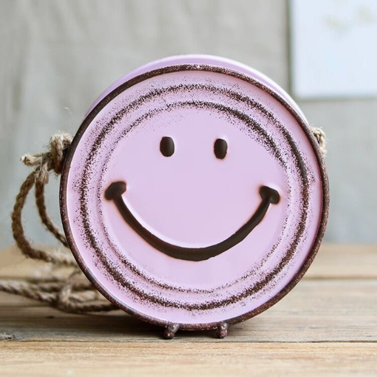 Happy Face Hanging Planter pink round metal planter with smiley face and rope hanger on Tampa Home & Garden Store