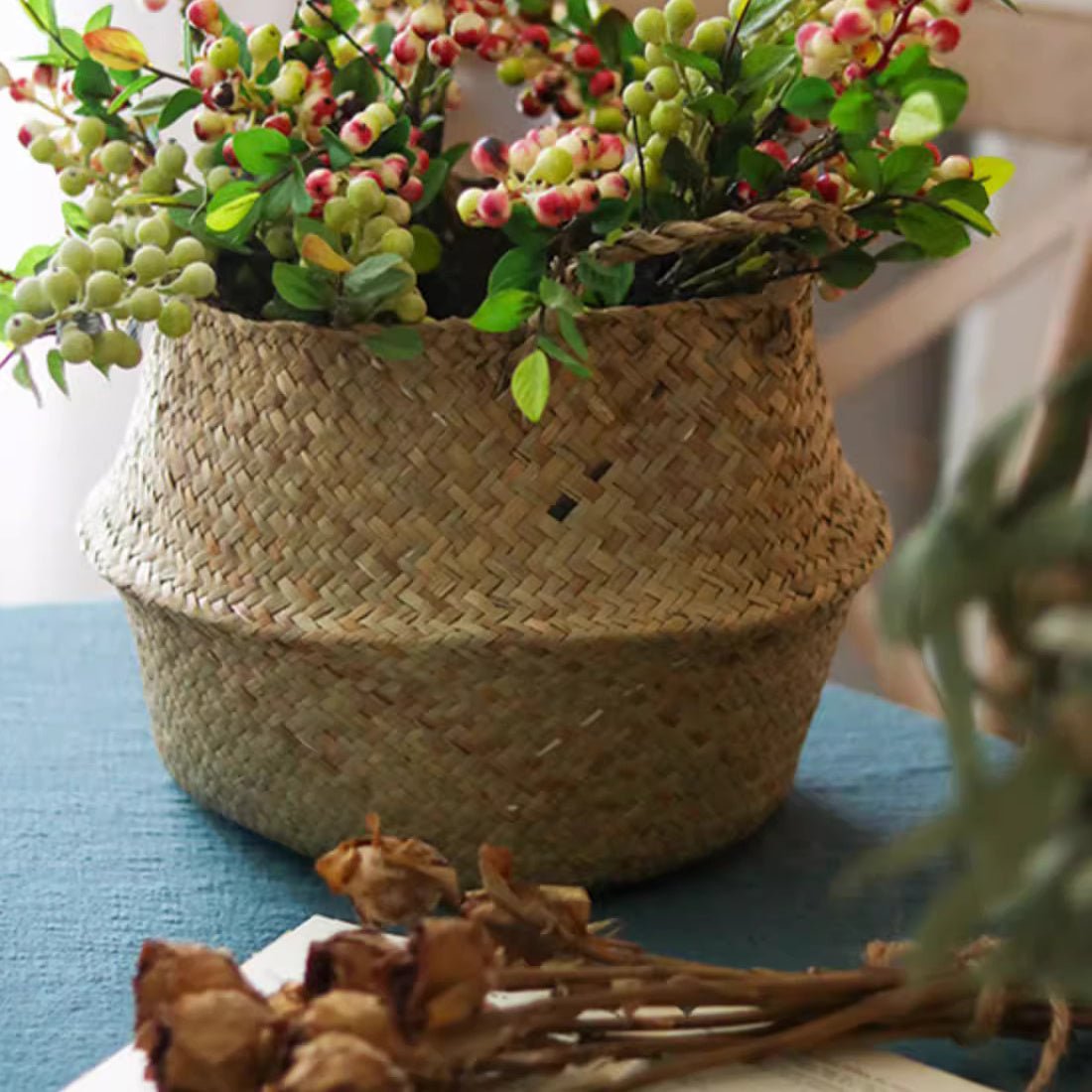 Foldable seagrass belly basket with handles woven RusticReach basket with berry greenery on Tampa Home & Garden Store