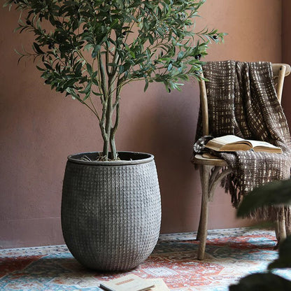 StoneNest Textured Planter in gray woven-style pot with olive tree RusticReach planter on Tampa Home & Garden Store