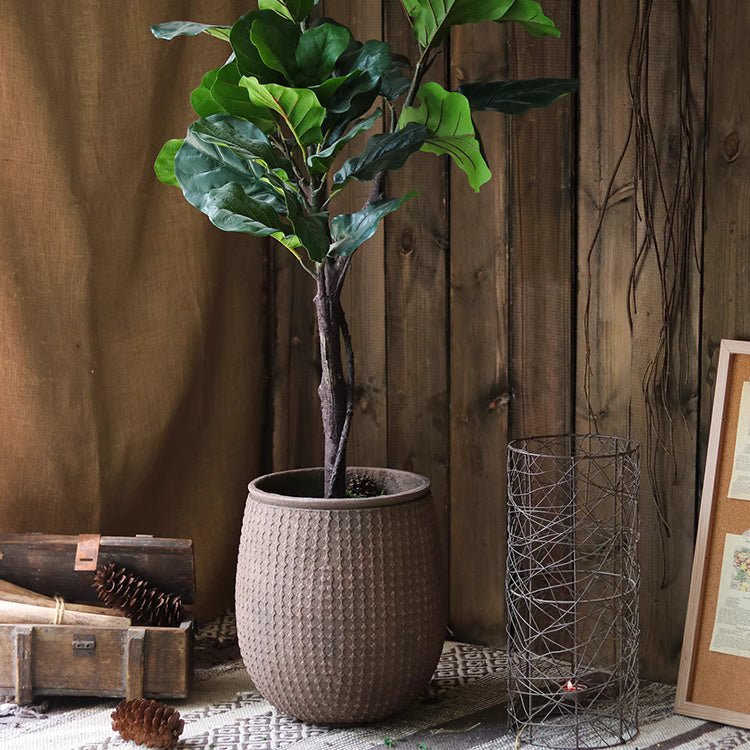 StoneNest Textured Planter by RusticReach; rounded brown planter with dotted texture on Tampa Home & Garden Store