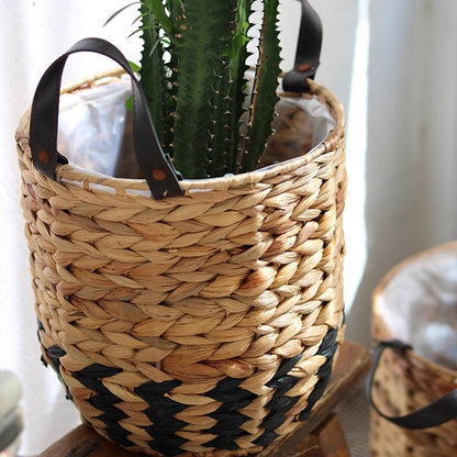 Two-Tone Basket Planter with Leather Handles, natural straw weave with black chevron base on Tampa Home & Garden Store
