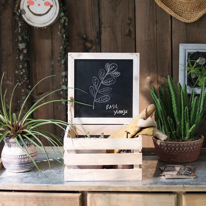 RusticReach wooden storage crate with chalkboard lid, light finish, on counter with plants on Tampa Home & Garden Store