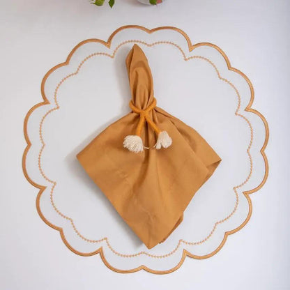 Tan Nautical Knot Napkin Ring Holder by Talah Home with knotted napkin on a scalloped plate on Tampa Home & Garden Store